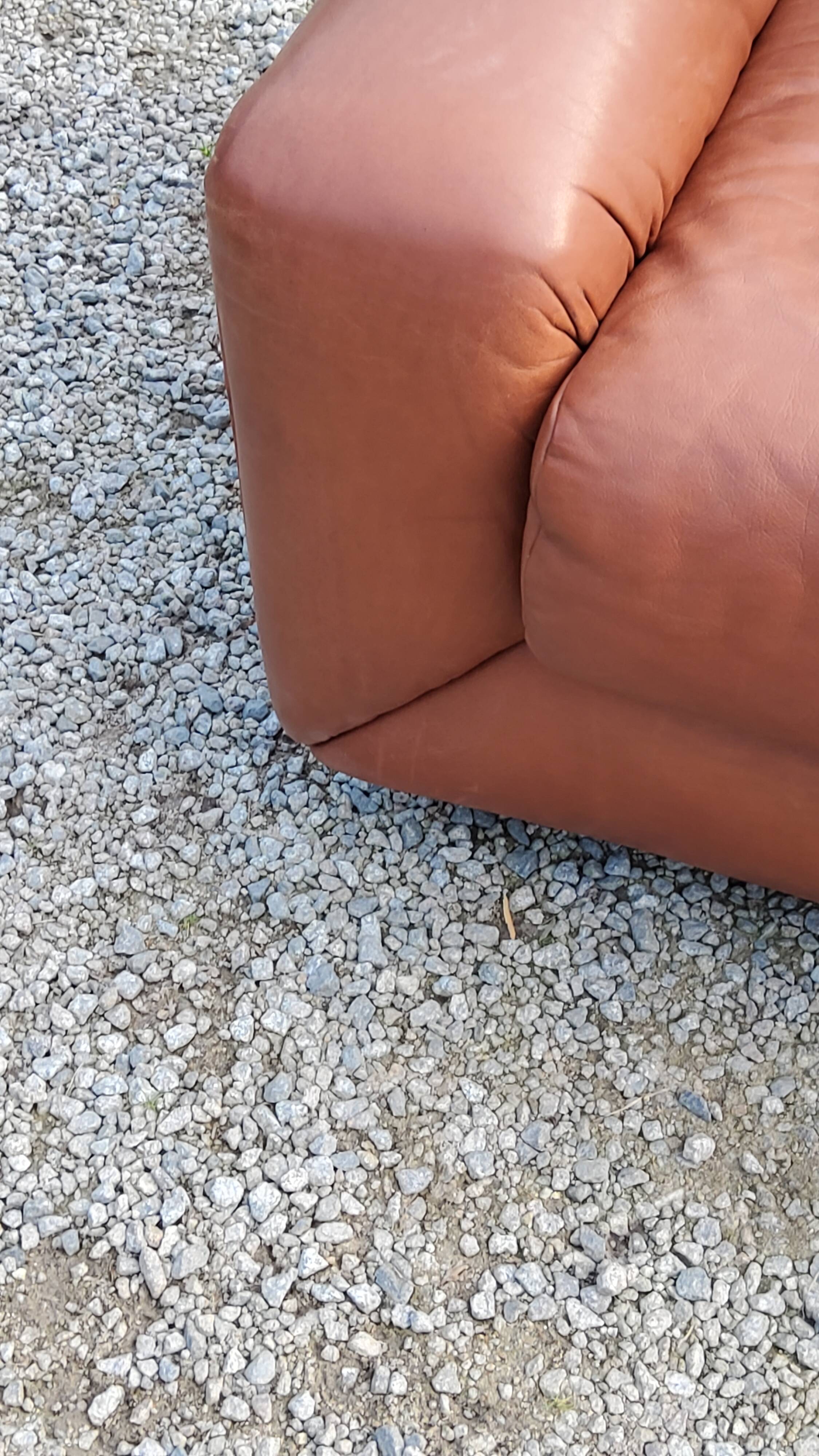 Pair of armchairs and De Sede sofa in cognac leather from the 70s/80s