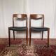Pair of vintage teak chairs with black faux leather – Scandinavian style