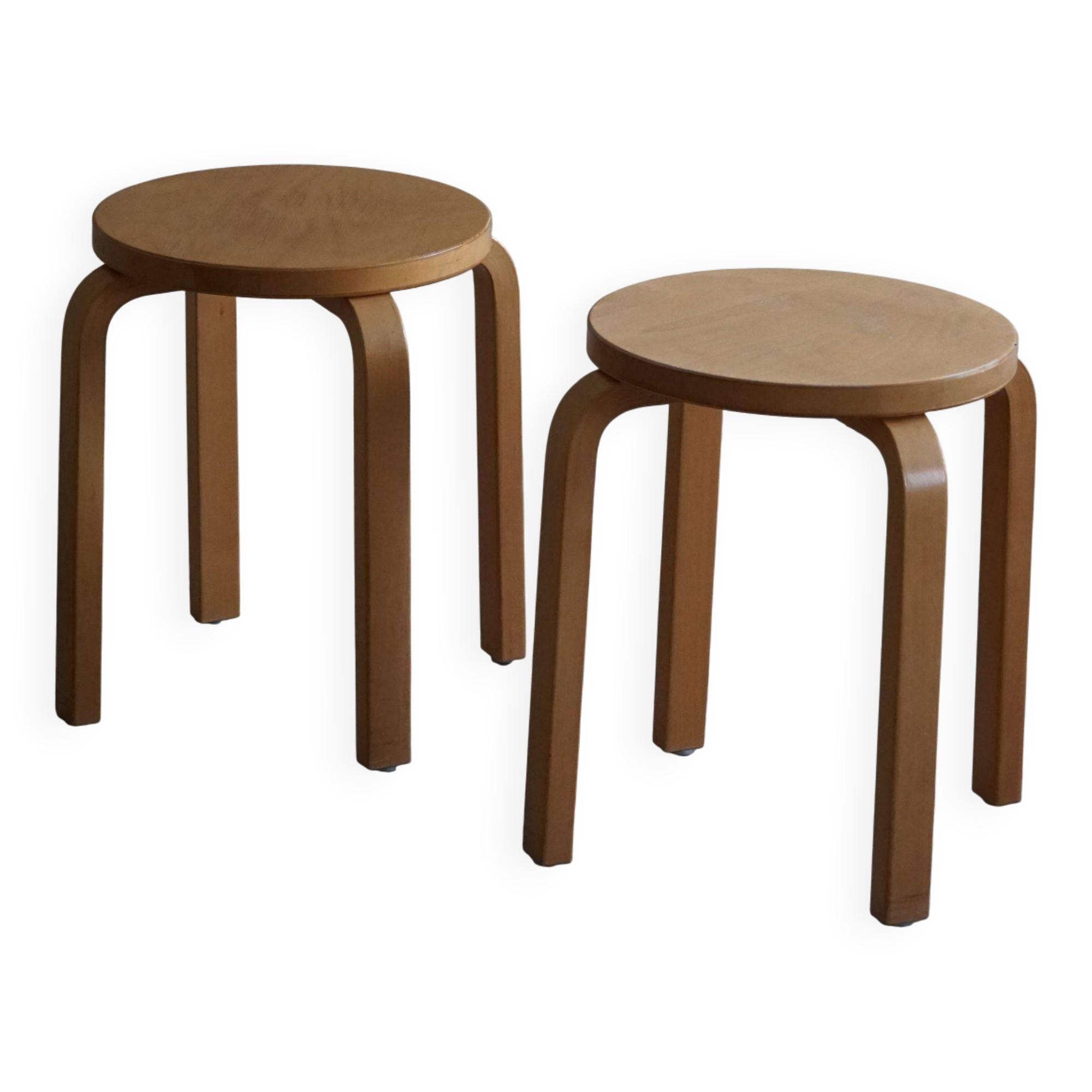 Alvar Aalto, a pair of vintage birch stools, model "60", made by Artek, 1970s.