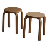 Alvar Aalto, a pair of vintage birch stools, model "60", made by Artek, 1970s.