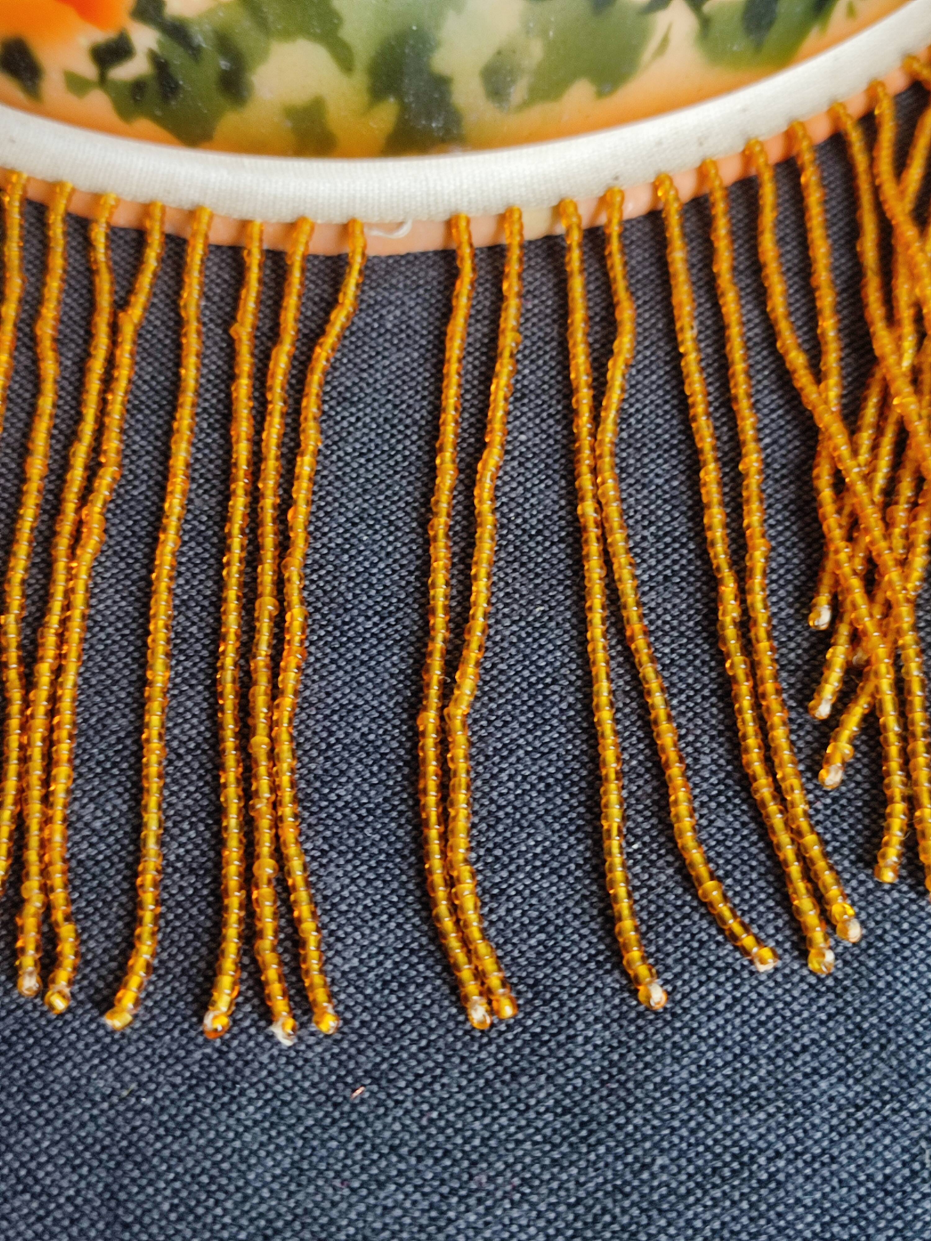Old opaline and its tassels hanging lamp