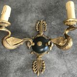 Antique bronze wall light with arm decorated with swans and palmettes in the Empire style