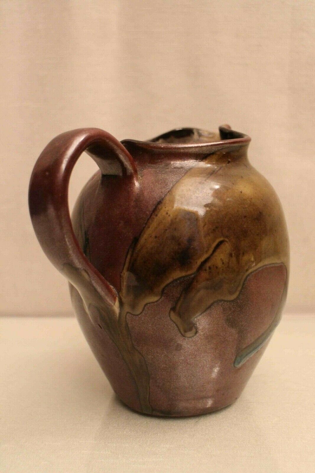Pitcher in glazed sandstone