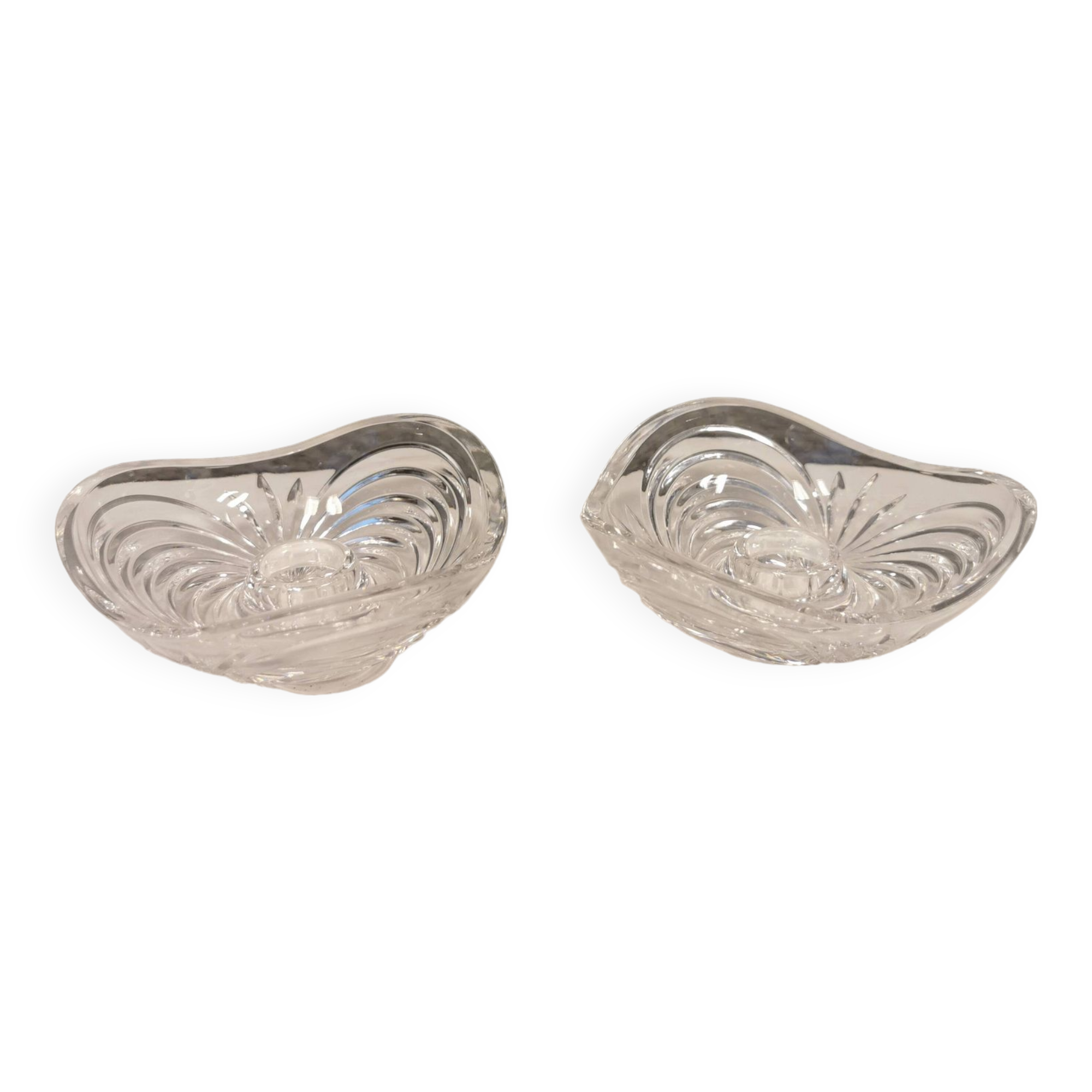 A set of beautiful rock crystal glass candle holders from Swedish Orrefors. Estimated 1970s.