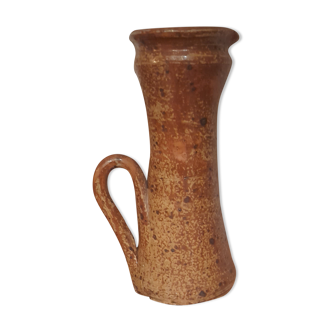 Old vintage water pitcher from the 70s in pyrite sandstone