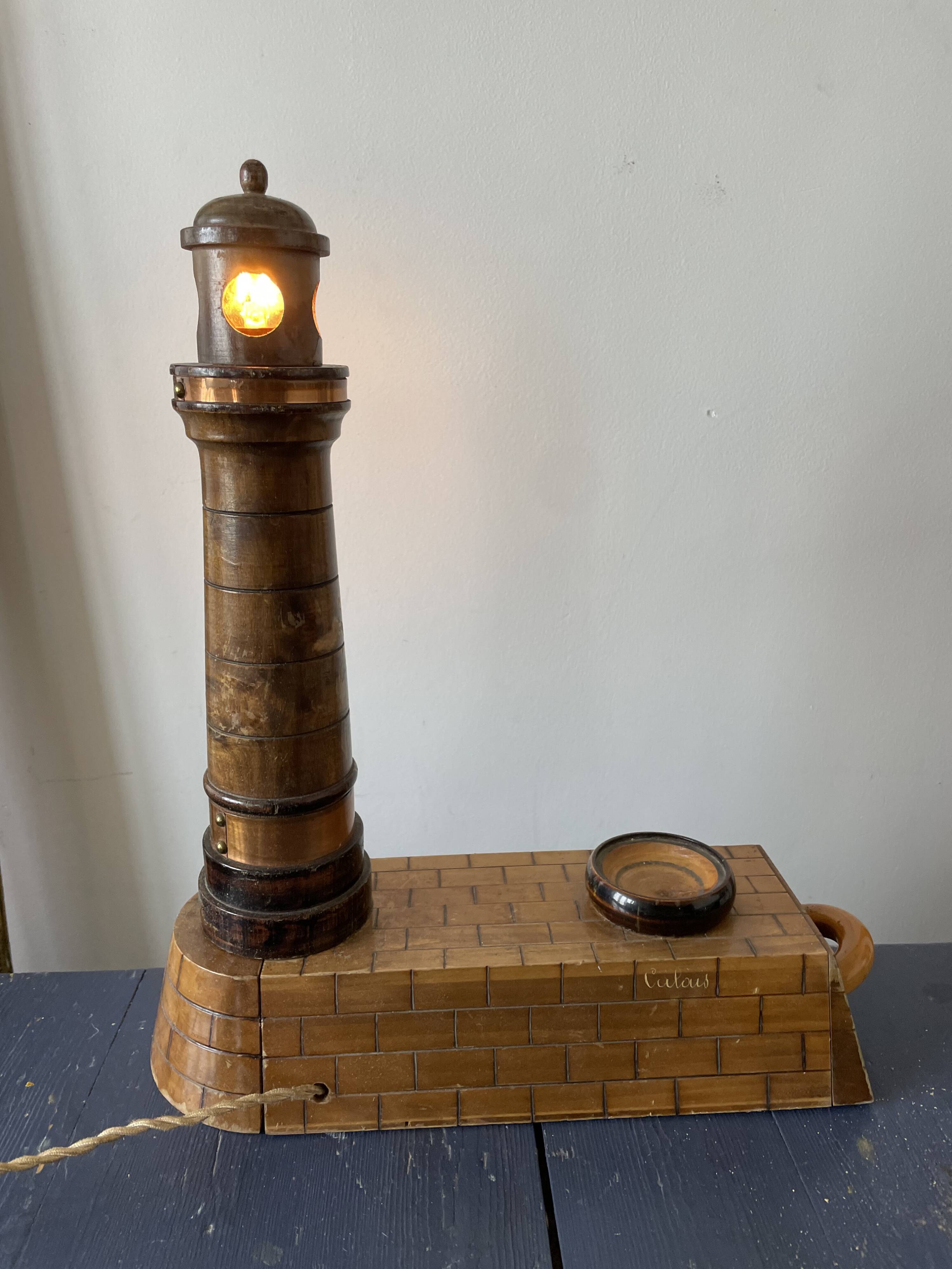 Souvenir lighthouse lamp from Calais in wood