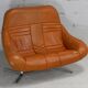Sofa "space age". Leather, fiberglass, foam, steel. Circa 1970. Orange.