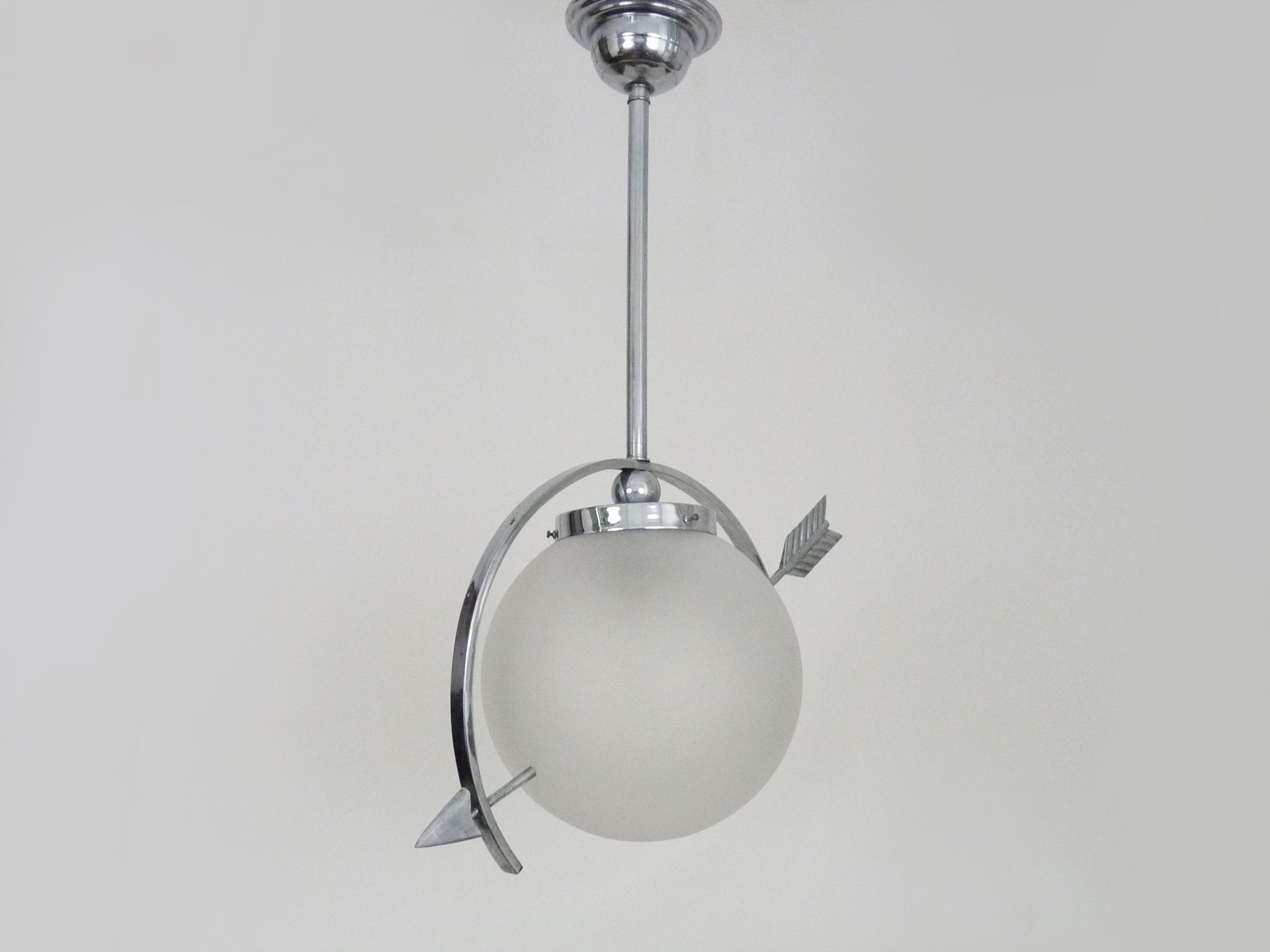 Suspension in chromed metal and glass, space age, arrow crossing a globe. Seventies