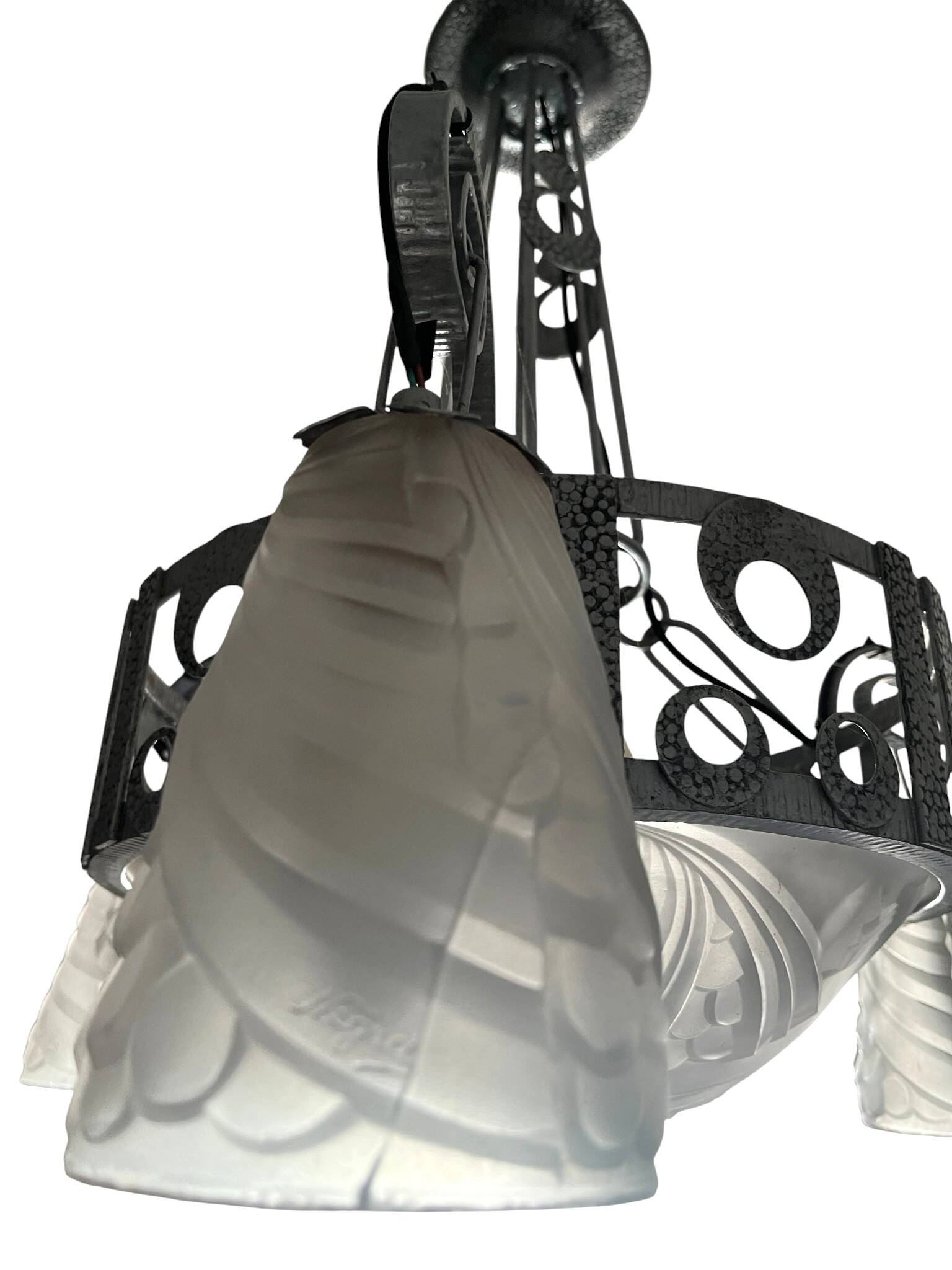Art Deco, 4-light chandelier, wrought iron, pressed glass, Dugué Negra, circa 1930.