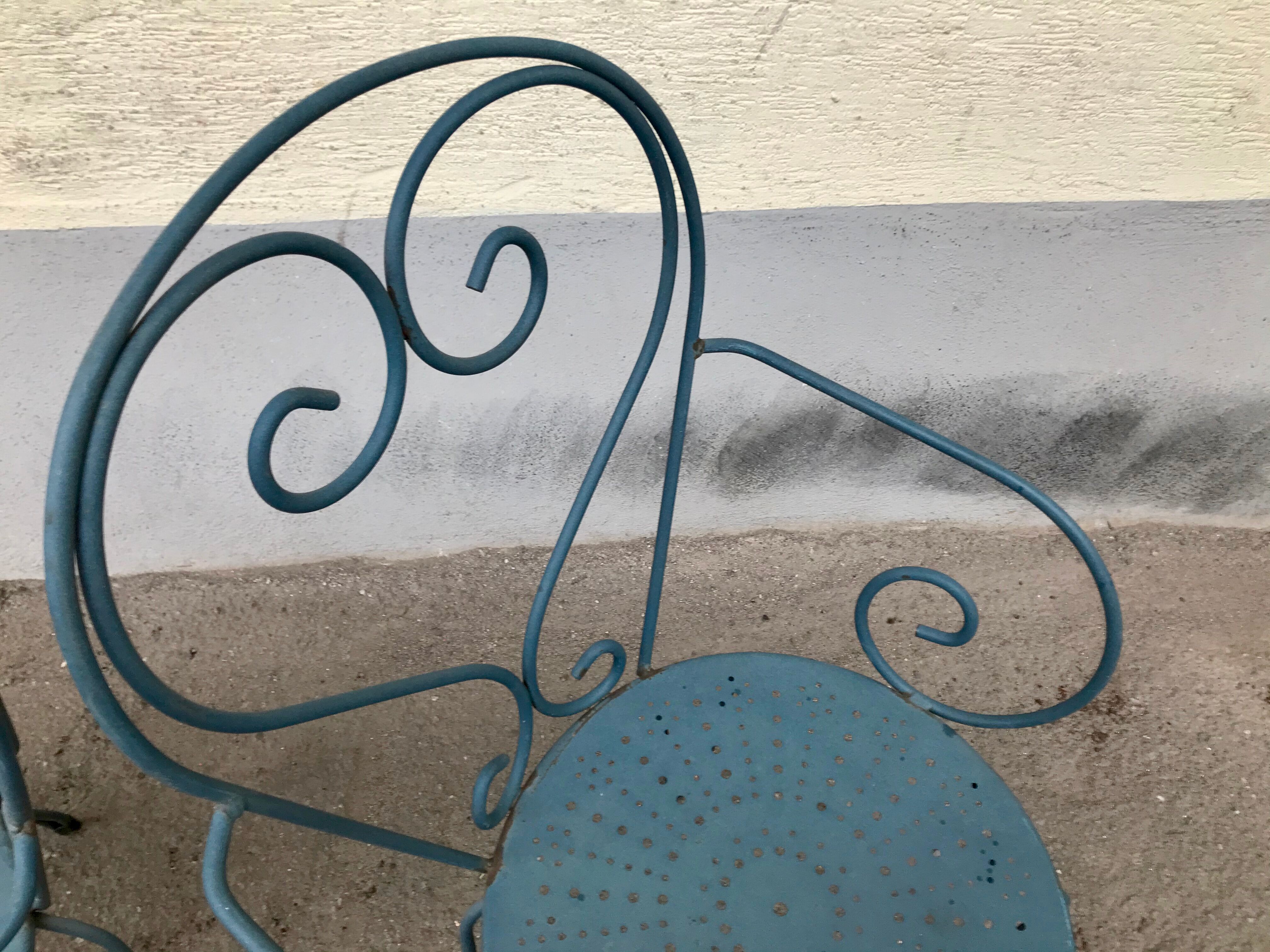 1 Table and 2 wrought iron garden chairs 1950 vintage