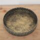 Round metal plate in patinated gold with an openwork border – D30 cm