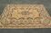 Beige mechanical carpet: 169 x 220 cm