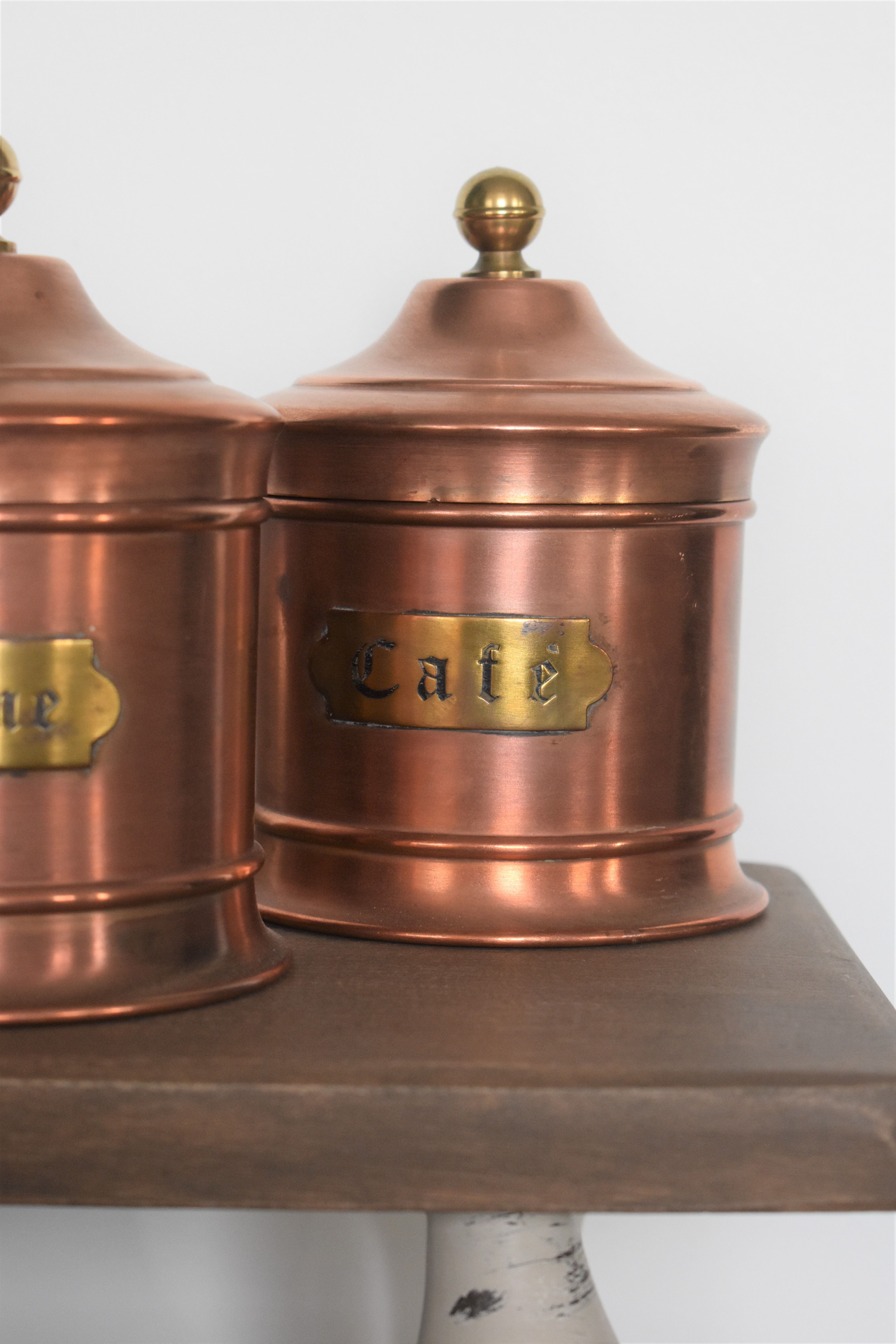Trio of copper spice pots