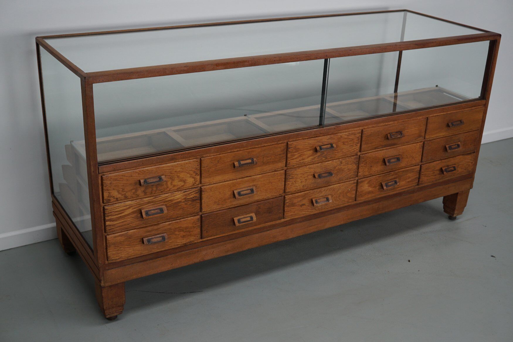 Antique British oak haberdashery cabinet, 1930s
