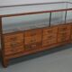 Antique British oak haberdashery cabinet, 1930s