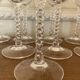 Set of 9 tall twisted and engraved crystal wine glasses