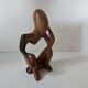 Wooden statuette sculpture of a thinking man design