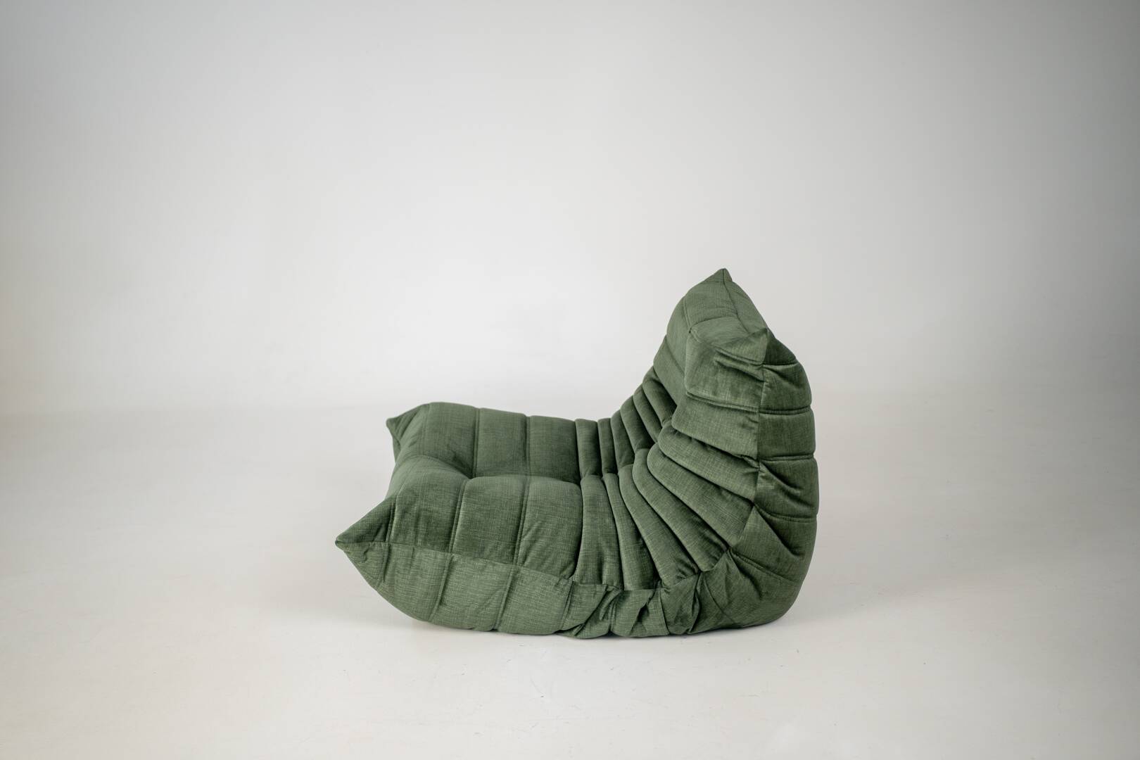 Togo set of armchair and pouf in moss velvet