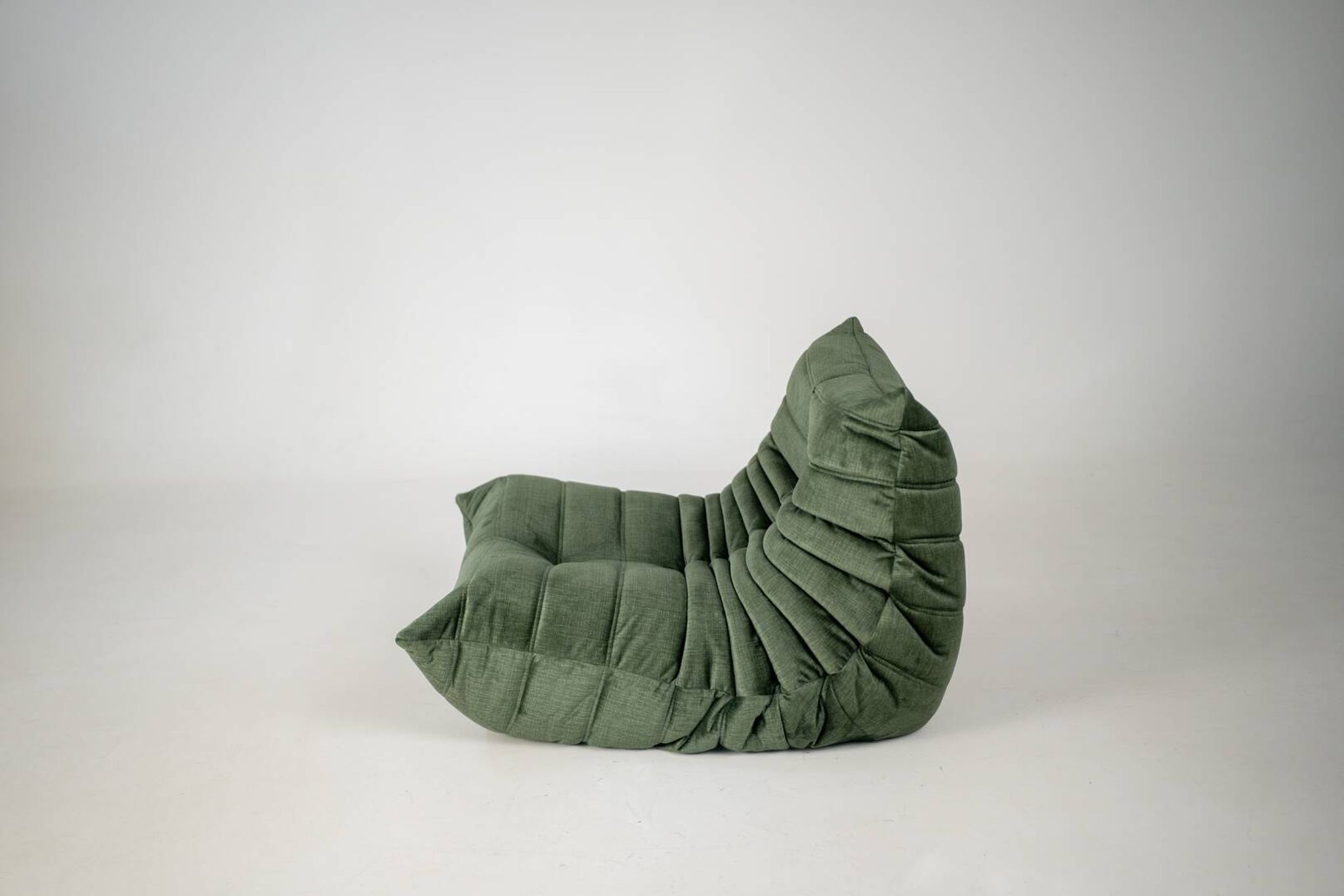Togo set of armchair and pouf in moss velvet