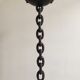 Wrought iron ashtray on its chain and anchor foot