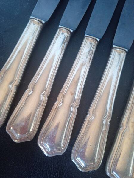 12 knives + silver metal punch from the 1950s