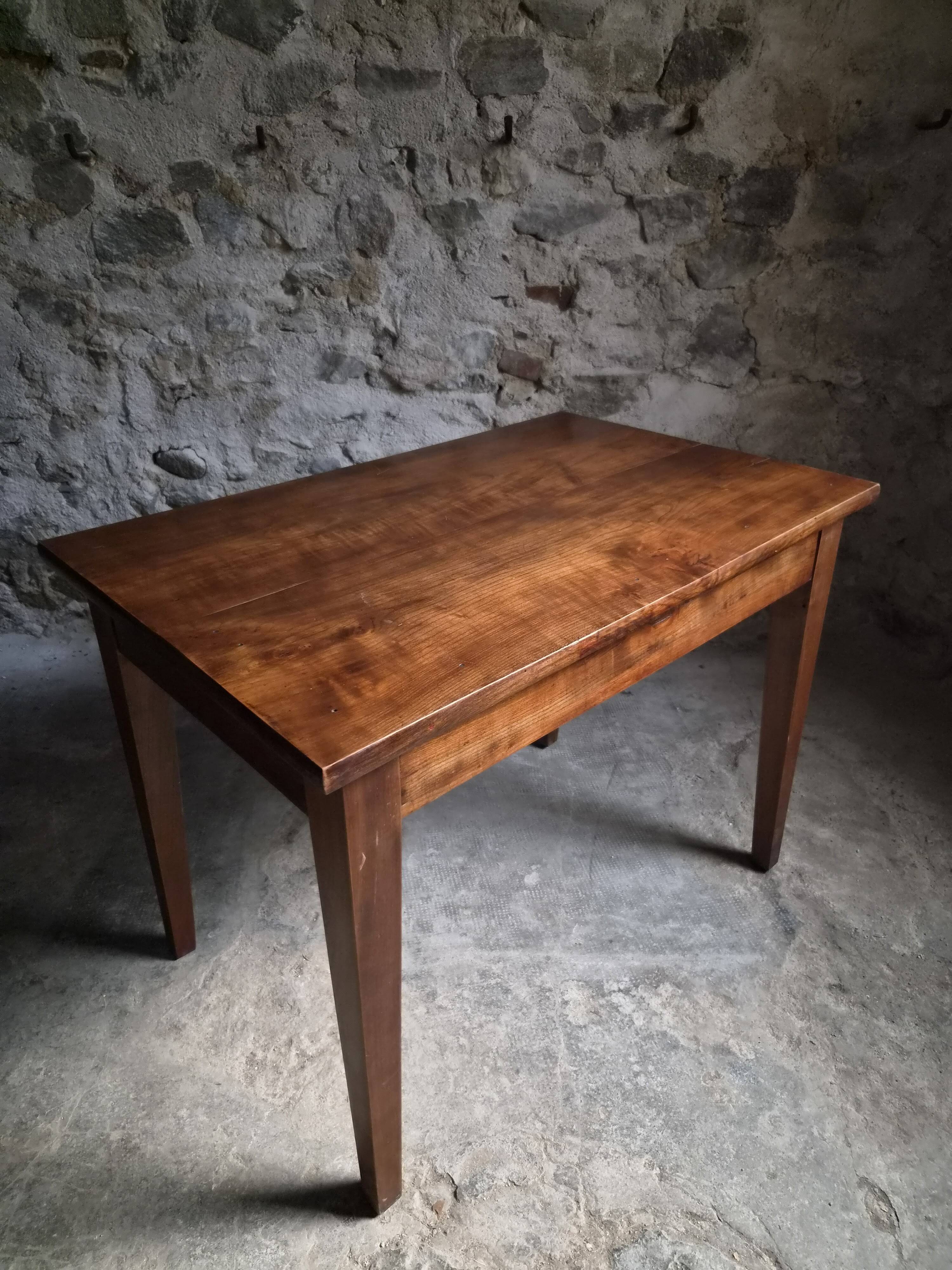 Old French table in cherry wood with bistro chair, circa 1900–1930.