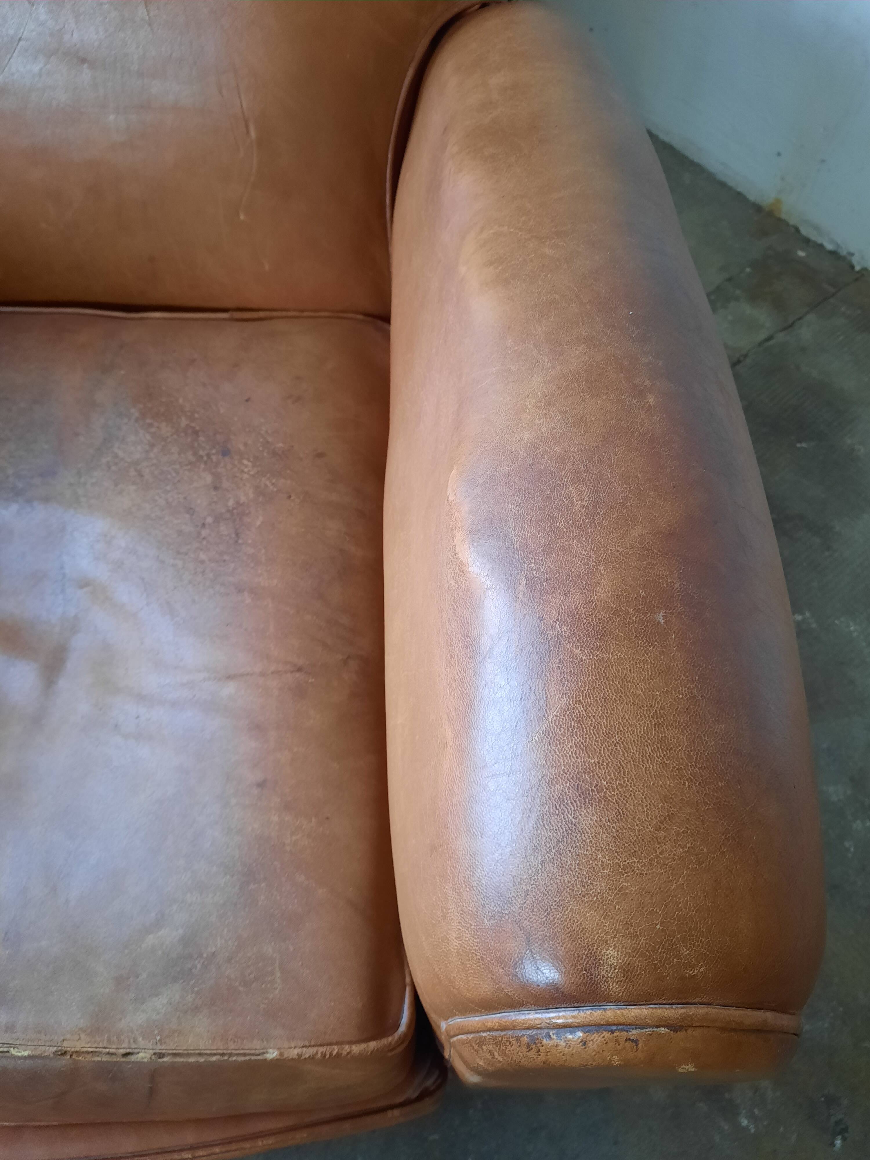 Old leather club chair 1940-1950