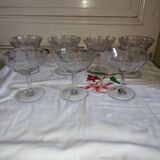 Beautiful set of seven crystal champagne glasses engraved with vine branches