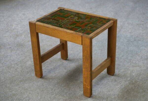 Solid oak side table with fabric decoration top