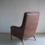Brown leather lounge chair | Netherlands | 1980s
