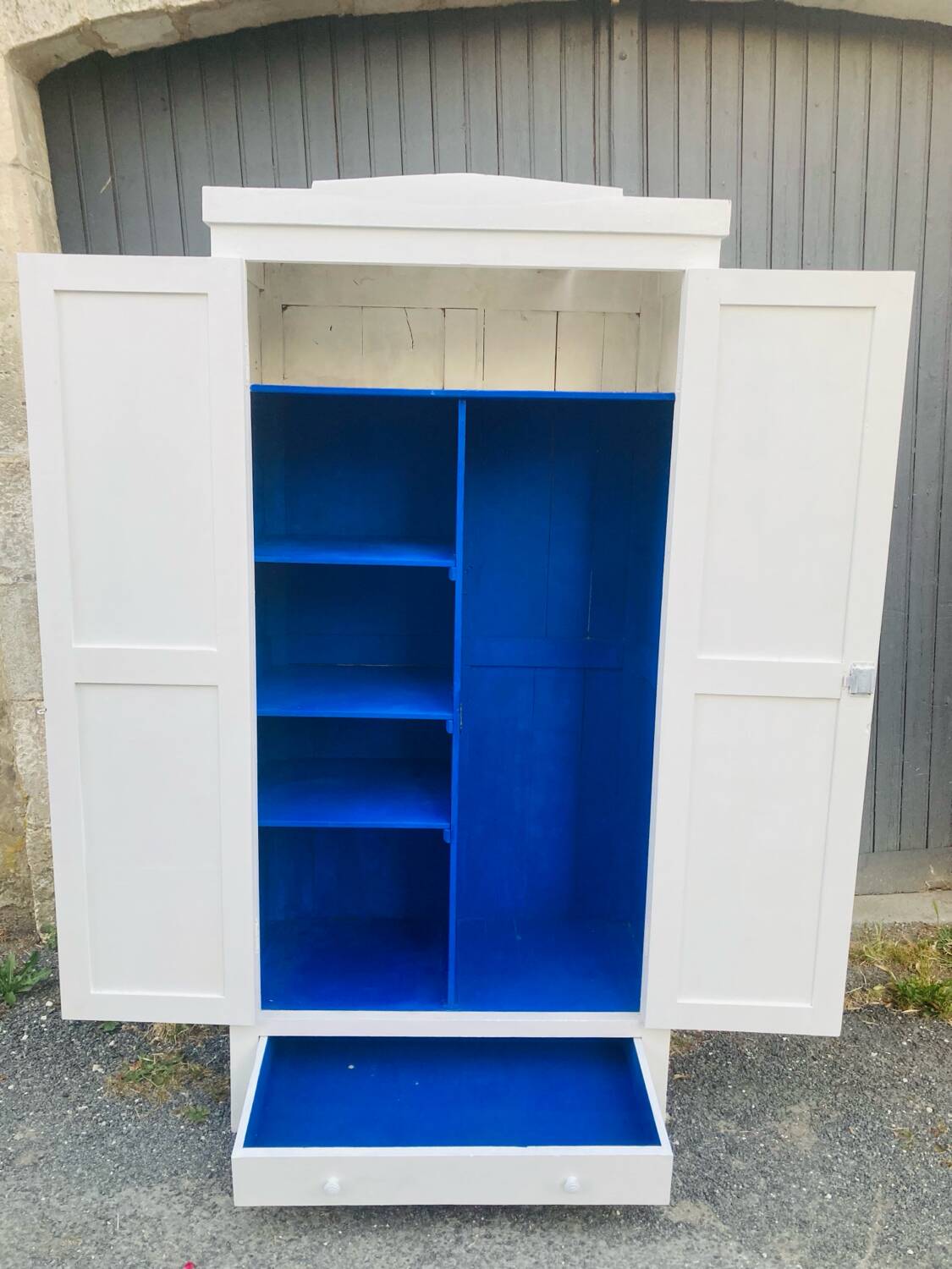 Antique white Parisian wardrobe with Majorelle blue interior