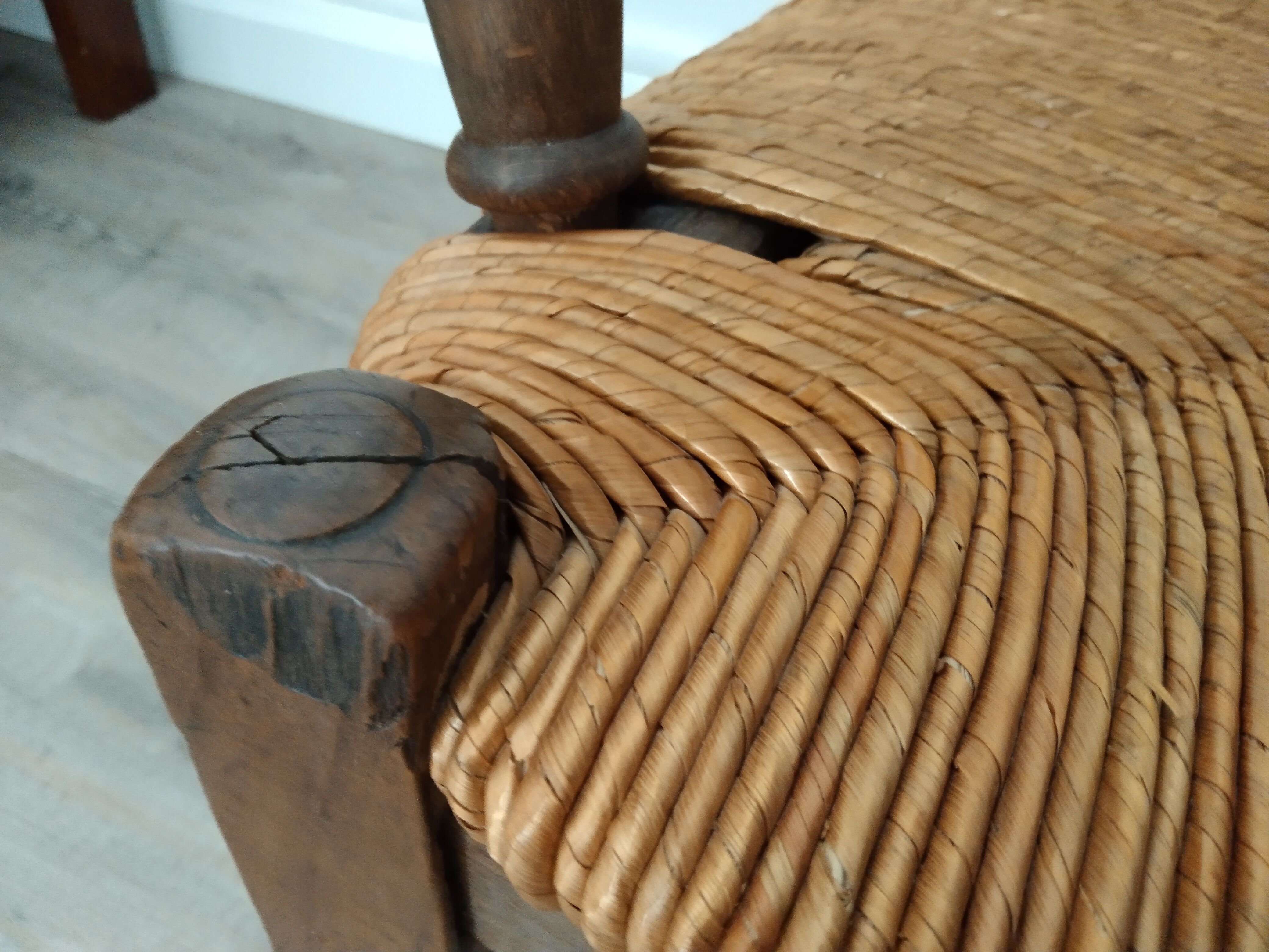 Straw armchair folk art.