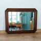 Miroir octogonal en bois.