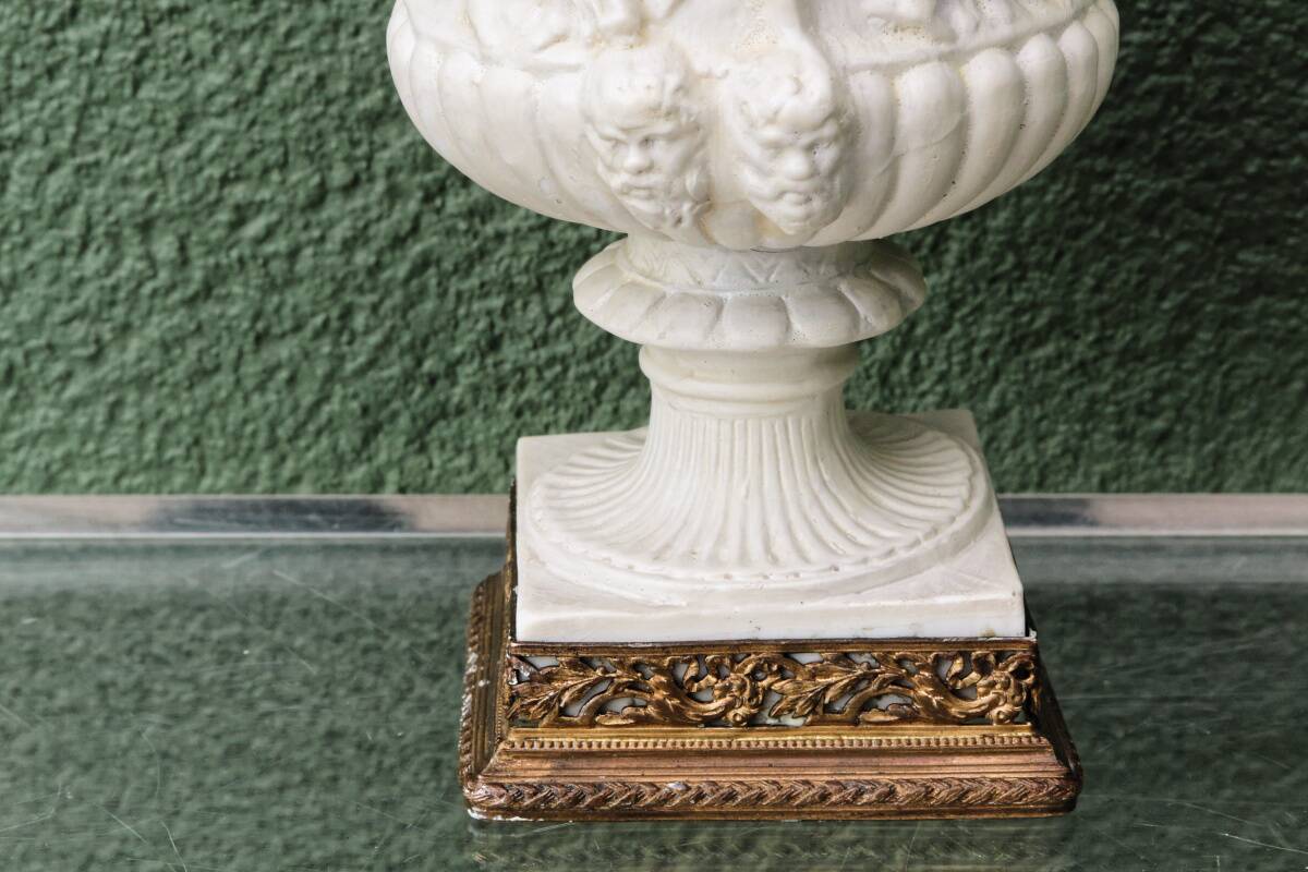 Pair of Medicis Borghese vases in porcelain biscuit and brass.
