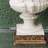 Pair of Medicis Borghese vases in porcelain biscuit and brass.