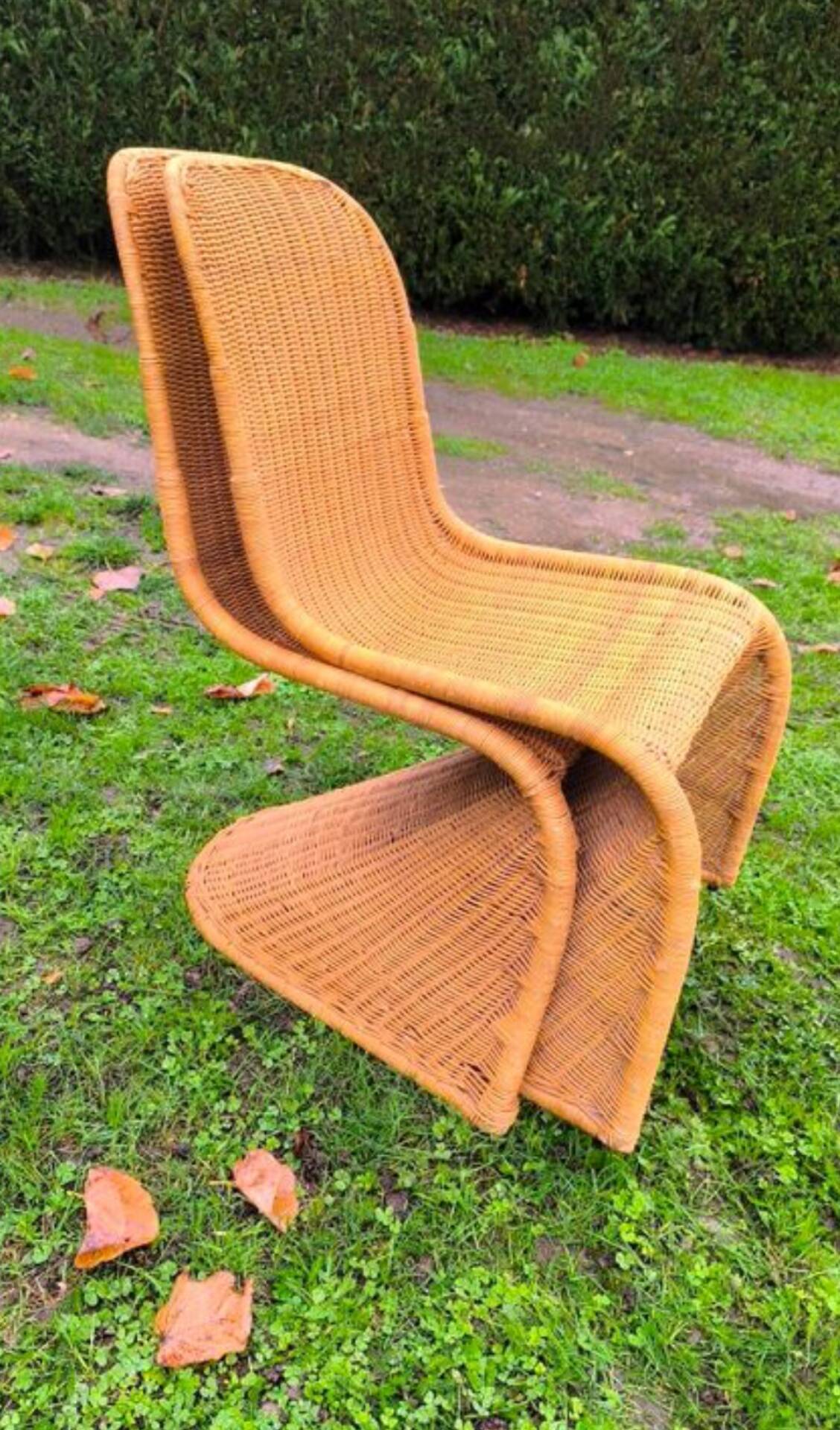 Pair of rattan chairs in the style of Verner Panton