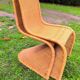 Pair of rattan chairs in the style of Verner Panton