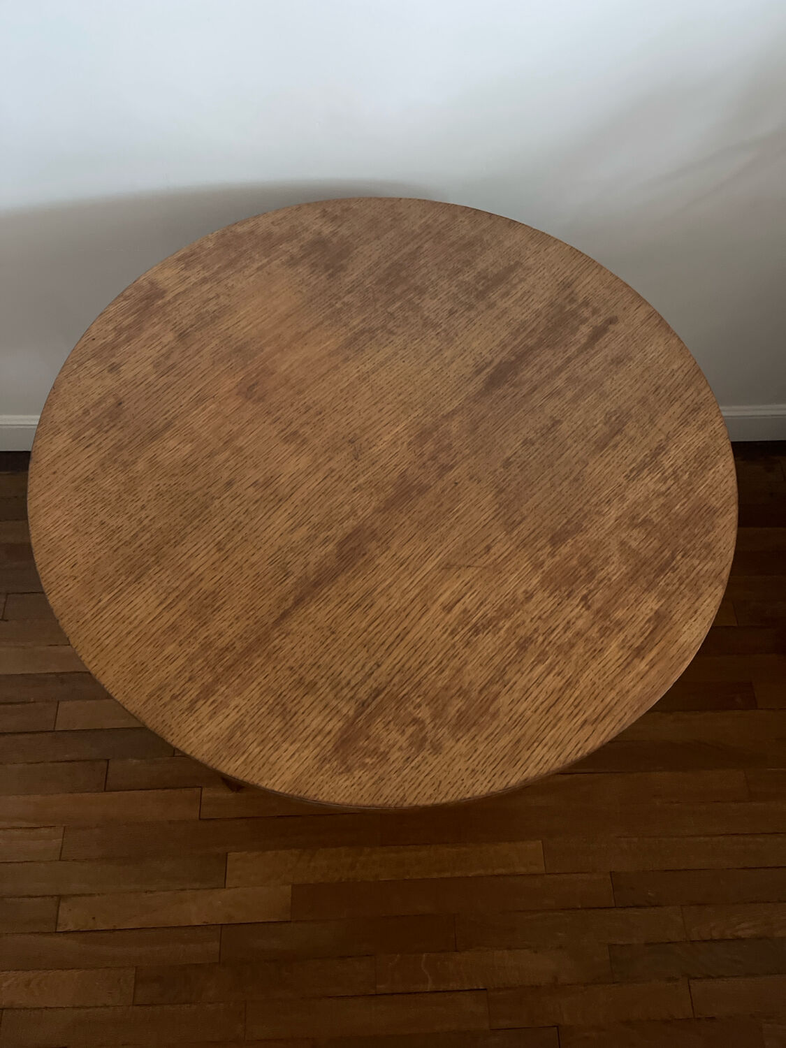 Low round art deco table in honey wood