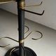 Minimalist black metal brass coat stand
