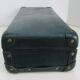 Vintage green cardboard suitcase