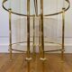 Table basse tripartite en laiton et verre