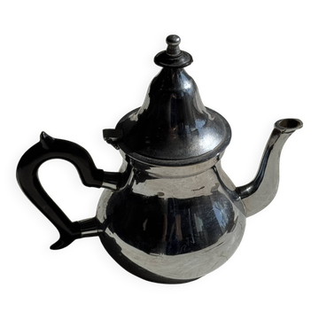 Silver-plated teapot with black handle
