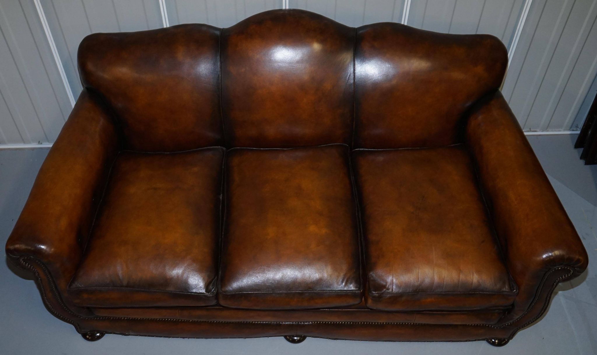 Restored vintage leather sofa from a gentleman's Victorian club.