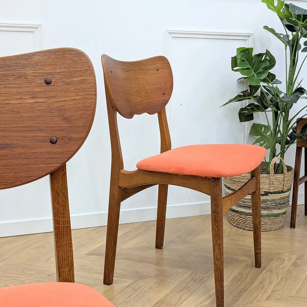 Pair of vintage orange Scandinavian chairs
