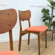Pair of vintage orange Scandinavian chairs