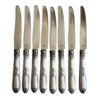 8 silver-plated metal knives, engraved handles with refined details.