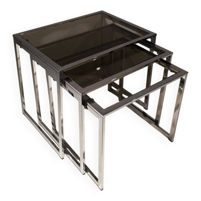 Suite de 3 tables gigognes chromées. Vers 1970