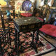 Napoleon III work table in blackened burgundy wood with gilded highlights.