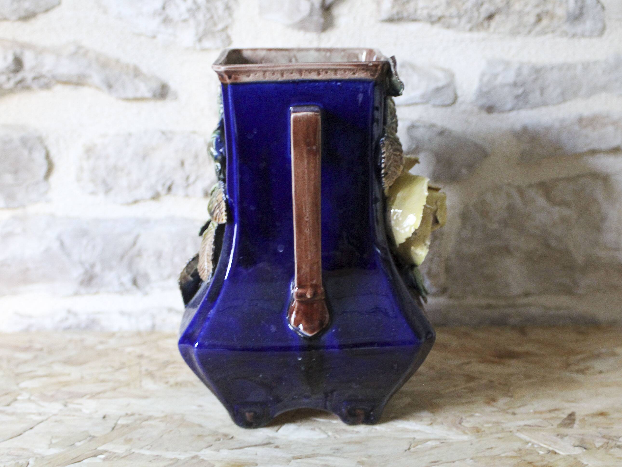 Slip vase decorated with flowers