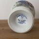 Adorable small porcelain vase from Paris with floral decoration.